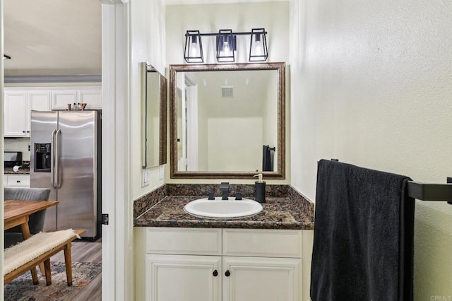 8980 Lamar St # 6, Spring Valley, CA 91977 - bathroom featuring vanity and wood finished floors