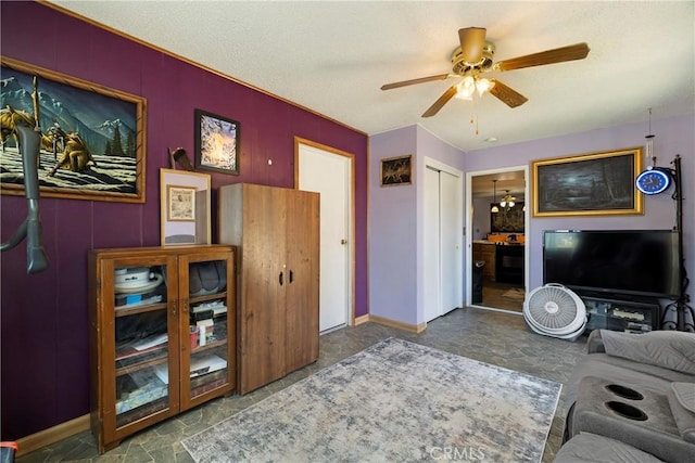 341 Mellane Cir, Orland, CA 95963 - living area featuring ceiling fan and baseboards