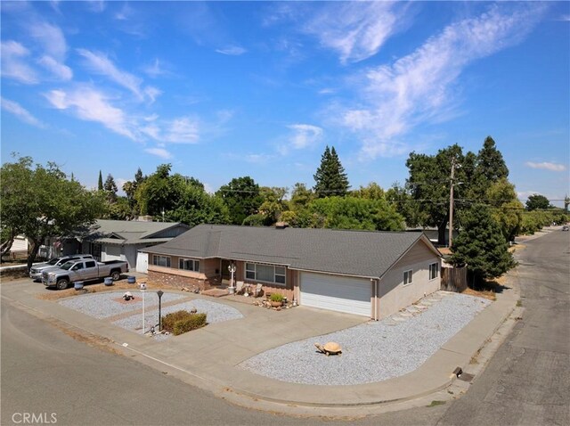 341 Mellane Cir, Orland, CA 95963 - ranch-style home with concrete driveway and an attached garage
