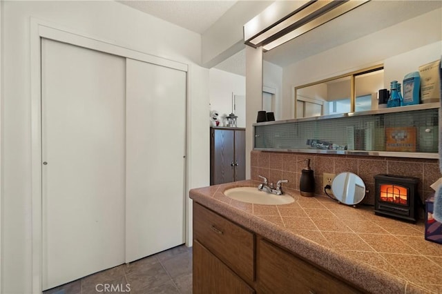 341 Mellane Cir, Orland, CA 95963 - bathroom with vanity and tasteful backsplash
