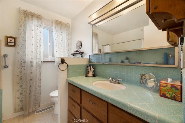 341 Mellane Cir, Orland, CA 95963 - bathroom with vanity, curtained shower, and backsplash