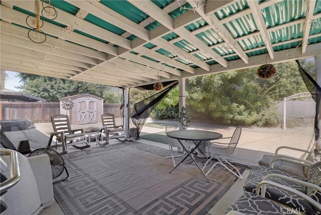 341 Mellane Cir, Orland, CA 95963 - fenced backyard featuring a storage shed and a patio area
