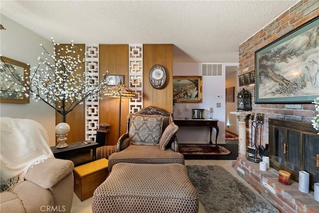 341 Mellane Cir, Orland, CA 95963 - living area with a textured ceiling and a fireplace