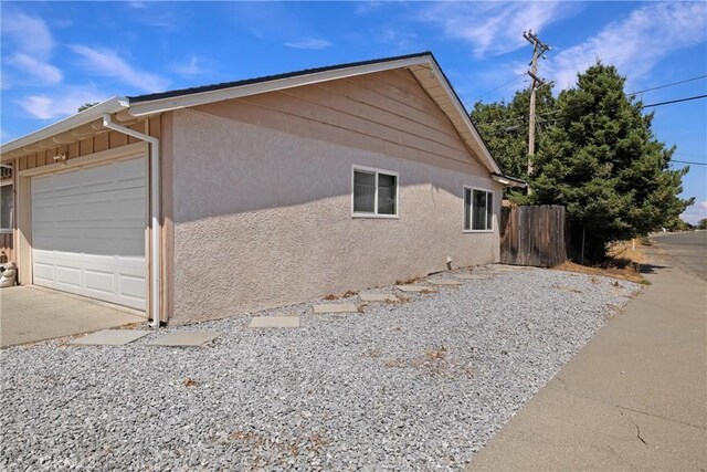 341 Mellane Cir, Orland, CA 95963 - view of home's exterior featuring stucco siding, a garage, and driveway