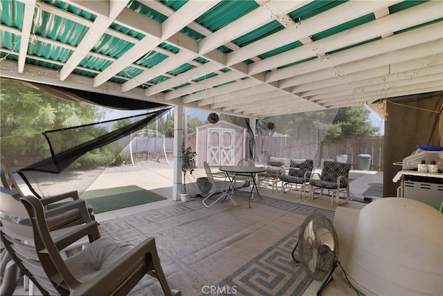 341 Mellane Cir, Orland, CA 95963 - fenced backyard with a storage unit, a patio area, and outdoor dining space