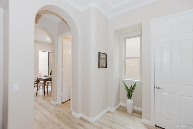 2740 E Bainbridge Rd, San Diego, CA 92106 - hall featuring light wood-style flooring, crown molding, and arched walkways