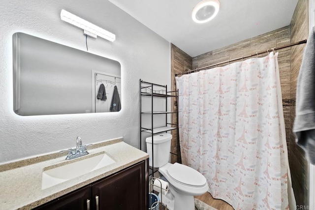 353 61st St, San Diego, CA 92114 - full bath with a textured wall, vanity, curtained shower, and wood finished floors