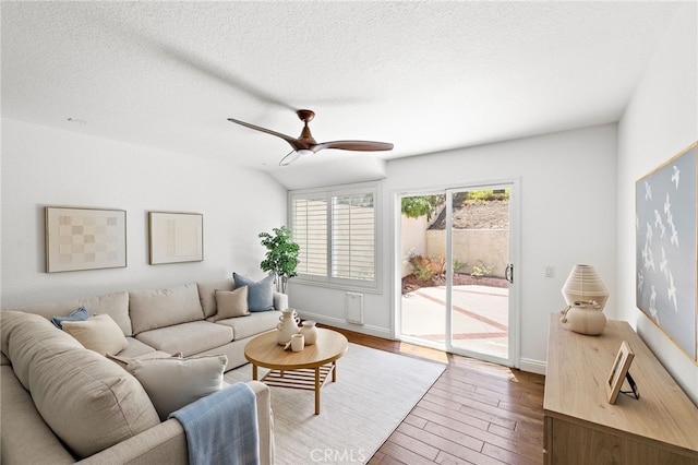 18 Saint Thomas, Laguna Niguel, CA 92677 - living area featuring wood finished floors, ceiling fan, and a textured ceiling