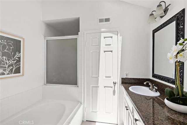 18 Saint Thomas, Laguna Niguel, CA 92677 - bathroom with a bath, double vanity, and a shower stall