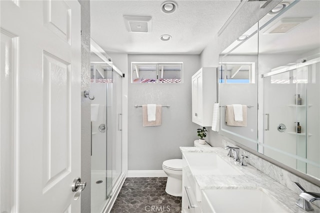 18 Saint Thomas, Laguna Niguel, CA 92677 - full bathroom featuring a stall shower, vanity, a textured ceiling, and tile patterned flooring