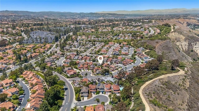 18 Saint Thomas, Laguna Niguel, CA 92677 - aerial view of property's location with a mountainous background and nearby suburban area
