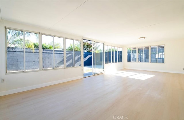 13870 Larwin Rd, La Mirada, CA 90638 - unfurnished sunroom featuring wood finished floors and healthy amount of natural light
