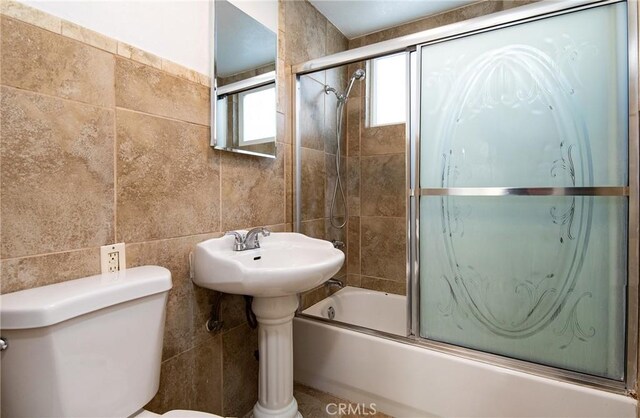 13870 Larwin Rd, La Mirada, CA 90638 - full bath with tile walls and combined bath / shower with glass door