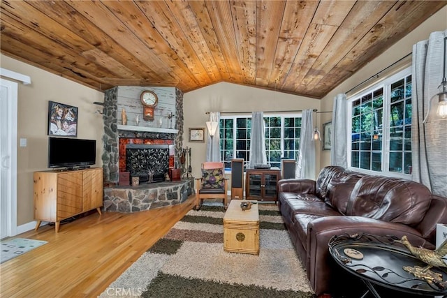 16635 Mountain View Dr, Cobb, CA 95426 - living room with wood ceiling, wood finished floors, vaulted ceiling, and a fireplace
