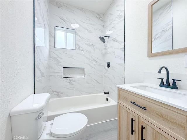 10408 Kalmia St, Los Angeles, CA 90002 - bathroom with vanity, shower / bathtub combination, and a textured wall