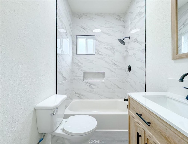 10408 Kalmia St, Los Angeles, CA 90002 - bathroom featuring a textured wall, vanity, and bathtub / shower combination