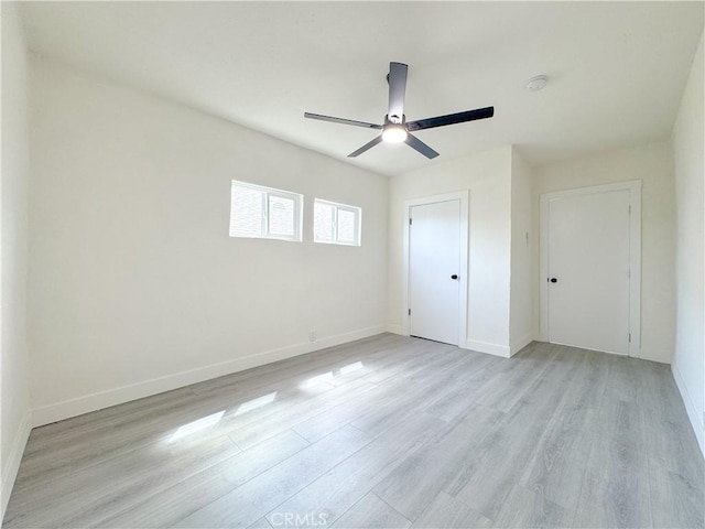10408 Kalmia St, Los Angeles, CA 90002 - unfurnished bedroom featuring light wood-type flooring and ceiling fan