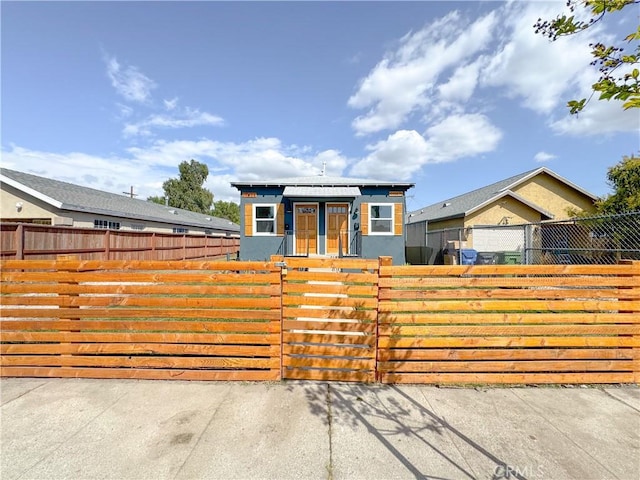 10408 Kalmia St, Los Angeles, CA 90002 - view of front of home with a fenced front yard and a gate