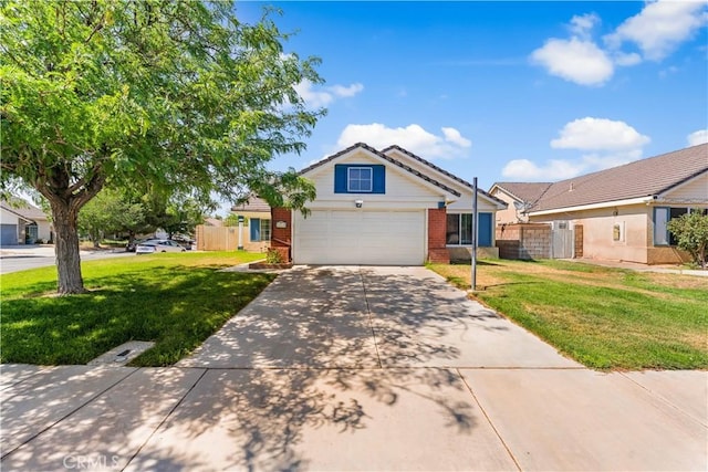 2019 Greentree St, Lancaster, CA 93535 - view of front of house with brick siding, driveway, and a garage