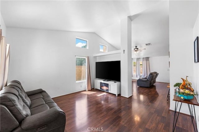 2019 Greentree St, Lancaster, CA 93535 - living room with vaulted ceiling, dark wood-style flooring, and a ceiling fan