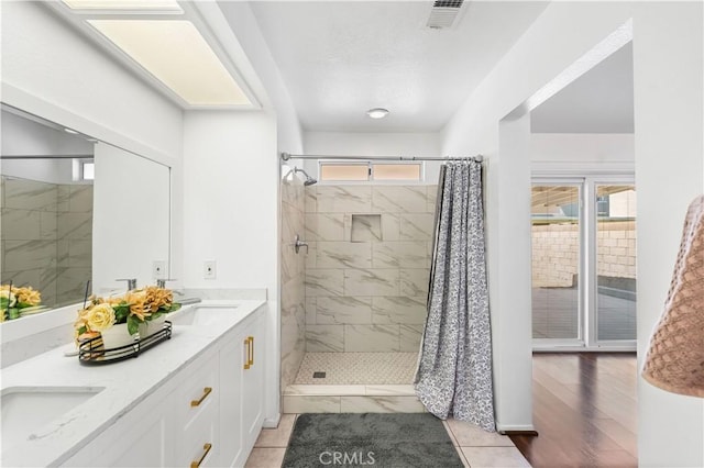 2019 Greentree St, Lancaster, CA 93535 - bathroom with a shower stall and double vanity