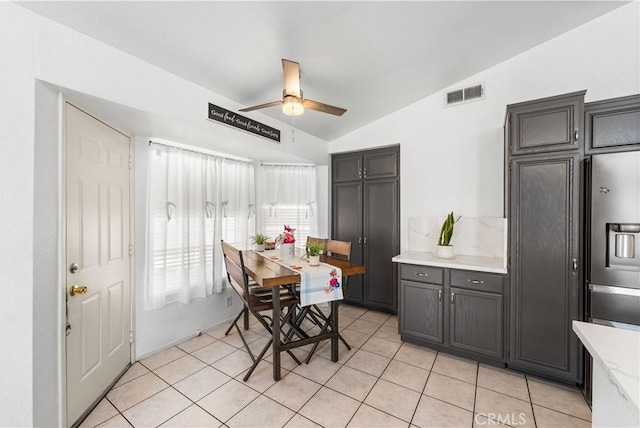 2019 Greentree St, Lancaster, CA 93535 - dining area featuring lofted ceiling, a ceiling fan, and light tile patterned floors