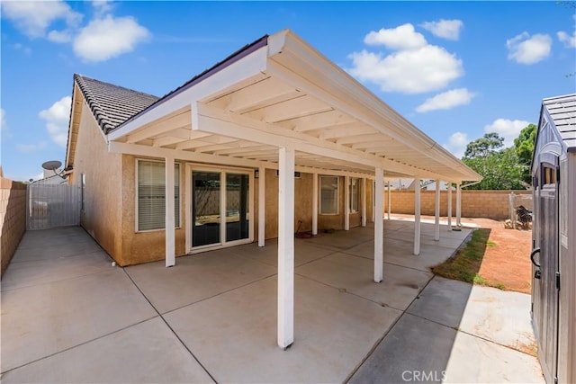 2019 Greentree St, Lancaster, CA 93535 - fenced backyard with a patio and a gate