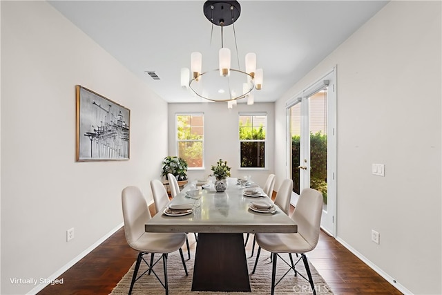 39886 Worthington Pl, Temecula, CA 92591 - dining area with dark wood-style floors, a chandelier, and french doors