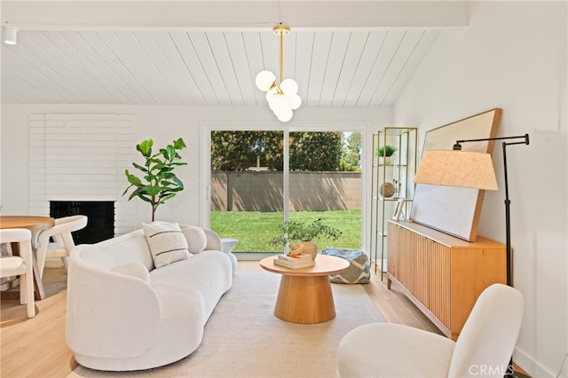 5839 Los Santos Way, Buena Park, CA 90620 - living room with light wood finished floors, a fireplace, and wood ceiling