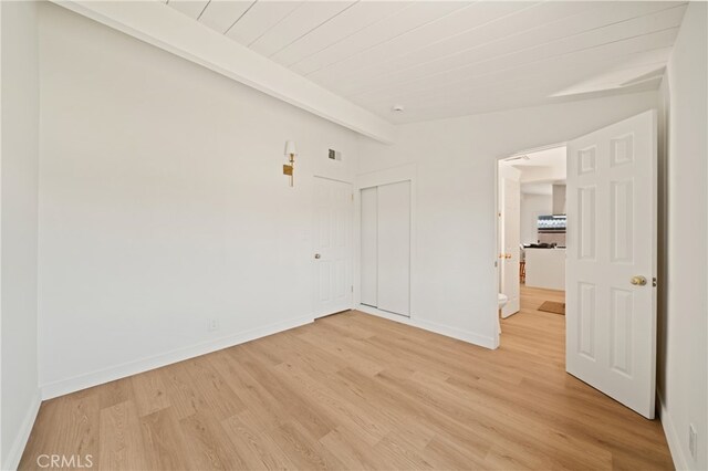 5839 Los Santos Way, Buena Park, CA 90620 - spare room featuring light wood-style flooring and wooden ceiling