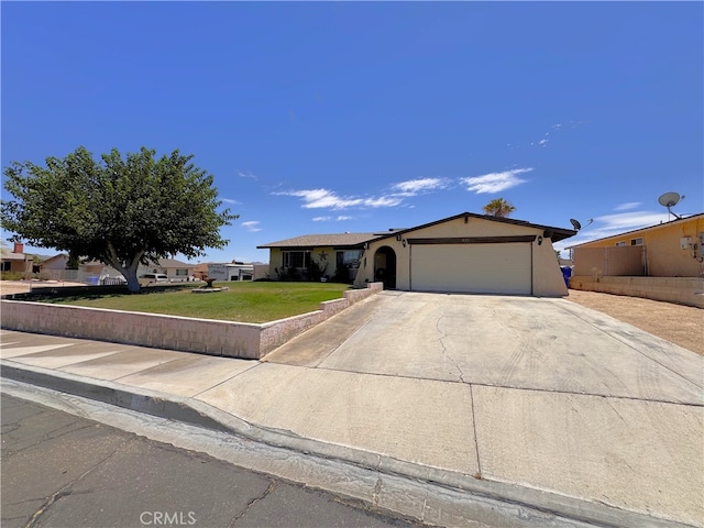 811 Mescal Dr, Barstow, CA 92311 - ranch-style home with an attached garage, a front yard, and concrete driveway
