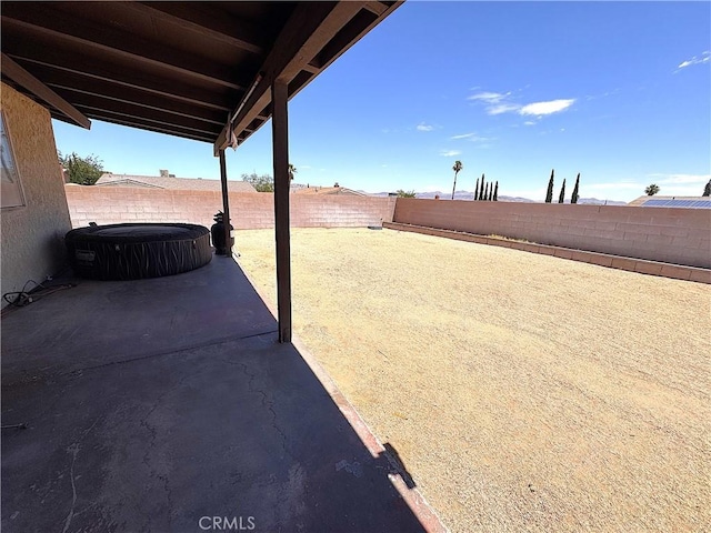 811 Mescal Dr, Barstow, CA 92311 - fenced backyard with a patio area
