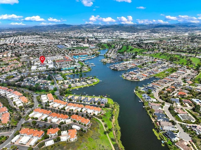 1508 Circa Del Lago Unit B205, San Marcos, CA 92078 - aerial view of property and surrounding area featuring a water and mountain view and nearby suburban area