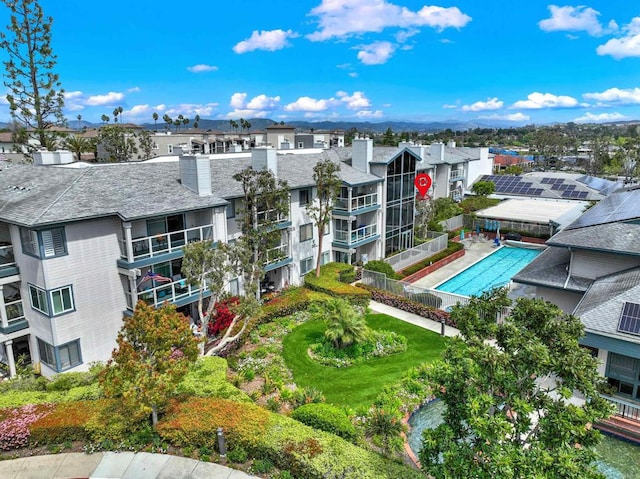 1508 Circa Del Lago Unit B205, San Marcos, CA 92078 - view of building exterior with a residential view and a community pool