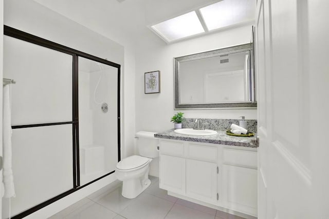 1508 Circa Del Lago Unit B205, San Marcos, CA 92078 - full bath featuring vanity, a shower stall, and tile patterned flooring