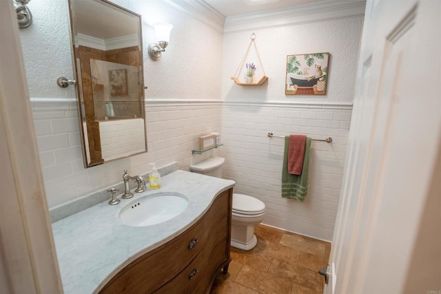 39668 Roripaugh Rd, Temecula, CA 92591 - full bathroom with vanity, crown molding, tile walls, wainscoting, and a textured wall