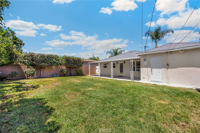 8328 Fernadel Ave, Pico Rivera, CA 90660 - fenced backyard with a patio area