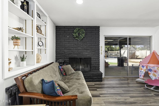 6100 Carter Ave, Bakersfield, CA 93308 - living room with wood finished floors and a fireplace