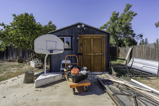 6100 Carter Ave, Bakersfield, CA 93308 - view of shed with a fenced backyard