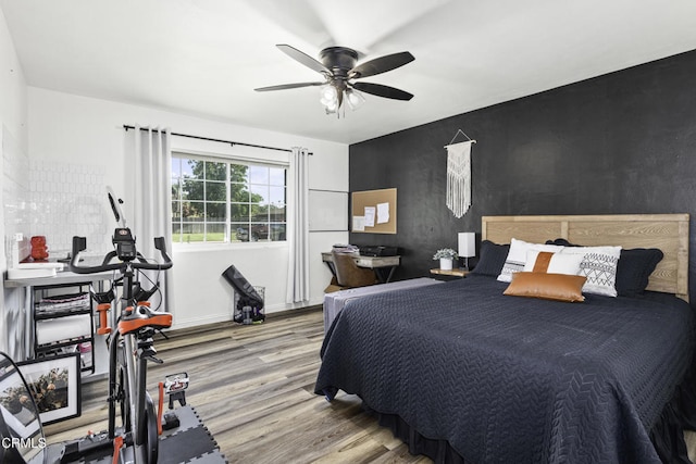 6100 Carter Ave, Bakersfield, CA 93308 - bedroom with wood finished floors and a ceiling fan