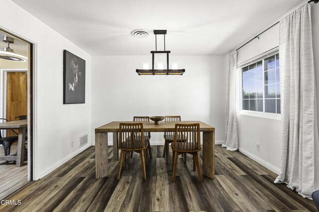 6100 Carter Ave, Bakersfield, CA 93308 - dining area featuring dark wood-style floors