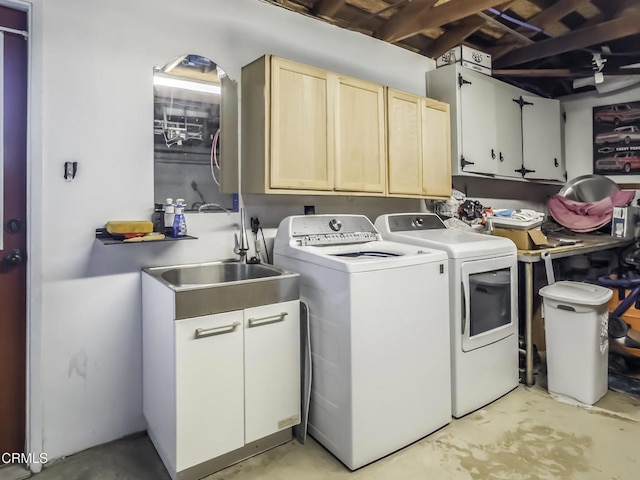 6100 Carter Ave, Bakersfield, CA 93308 - laundry area featuring cabinet space and washing machine and clothes dryer