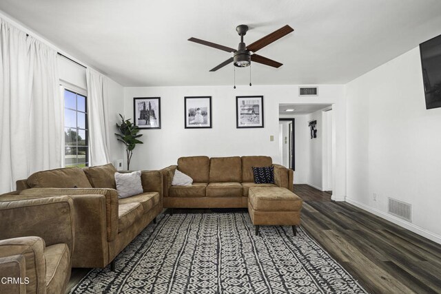 6100 Carter Ave, Bakersfield, CA 93308 - living area featuring a ceiling fan and dark wood-type flooring