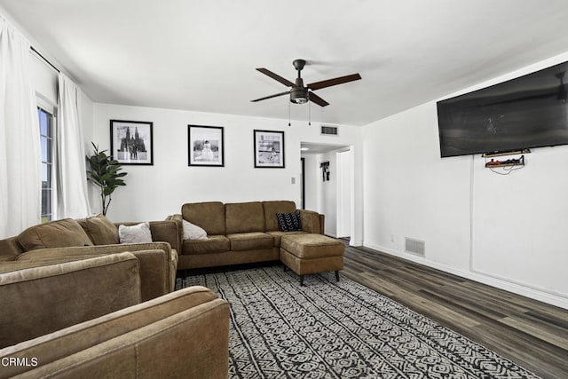 6100 Carter Ave, Bakersfield, CA 93308 - living area with dark wood-style flooring and a ceiling fan
