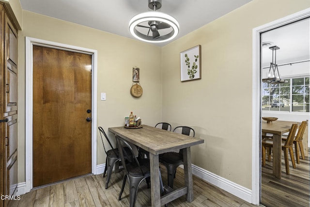 6100 Carter Ave, Bakersfield, CA 93308 - dining room featuring baseboards and light wood-style flooring