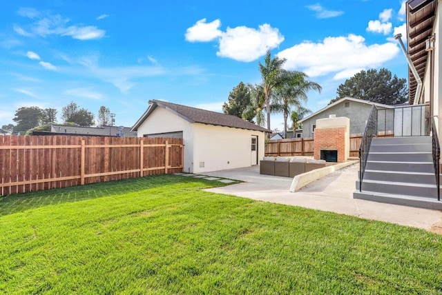 640 Pyramid St, San Diego, CA 92114 - fenced backyard featuring a patio area and an outdoor living space with a fireplace