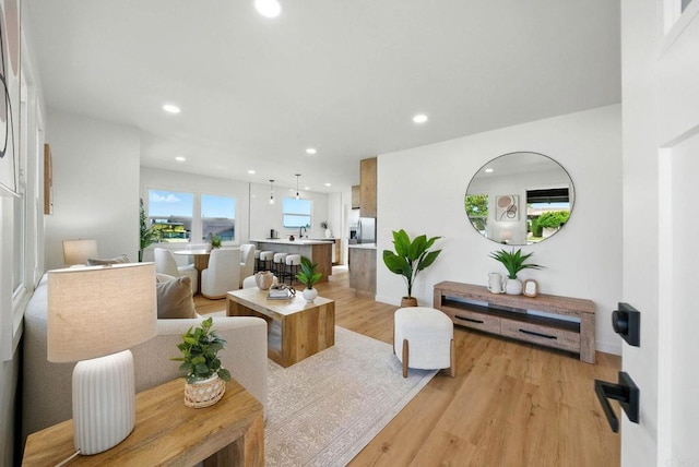640 Pyramid St, San Diego, CA 92114 - living room with light wood-style flooring and recessed lighting