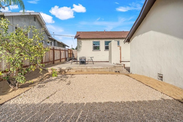 640 Pyramid St, San Diego, CA 92114 - rear view of property with stucco siding, a patio area, and a shingled roof