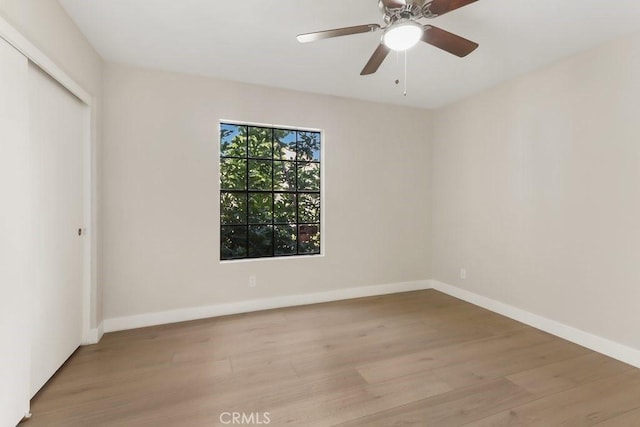 2639 Cameron Unit 119, Anaheim, CA 92801 - unfurnished bedroom featuring wood finished floors, a closet, and ceiling fan