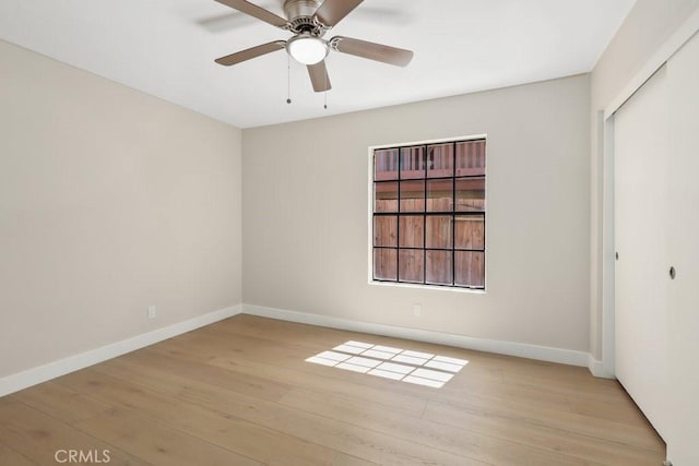2639 Cameron Unit 119, Anaheim, CA 92801 - unfurnished bedroom with light wood-style flooring, a closet, and a ceiling fan